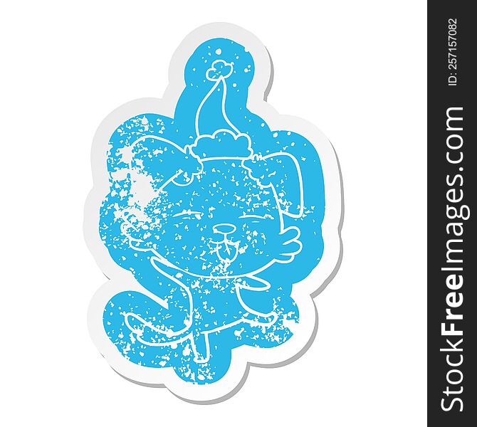 Cartoon Distressed Sticker Of A Dancing Dog Wearing Santa Hat