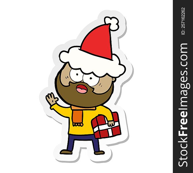 hand drawn sticker cartoon of a bearded man with present wearing santa hat