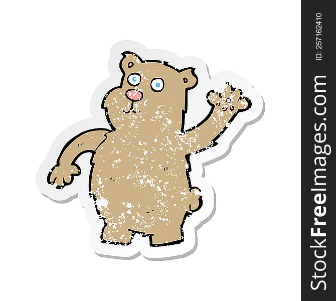Retro Distressed Sticker Of A Cartoon Waving Bear