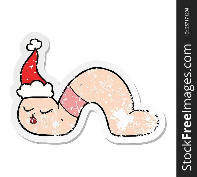 Distressed Sticker Cartoon Of A Worm Wearing Santa Hat