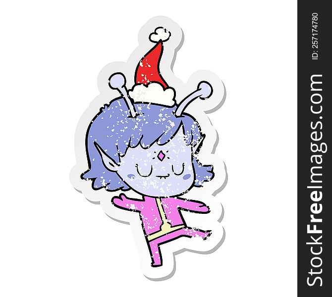 hand drawn distressed sticker cartoon of a alien girl wearing santa hat