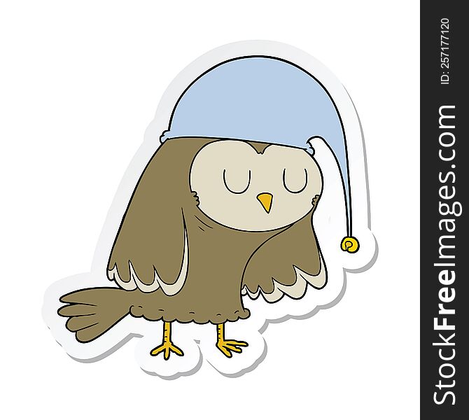 sticker of a cartoon owl sleeping