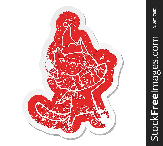 quirky cartoon distressed sticker of a crying wolf wearing santa hat