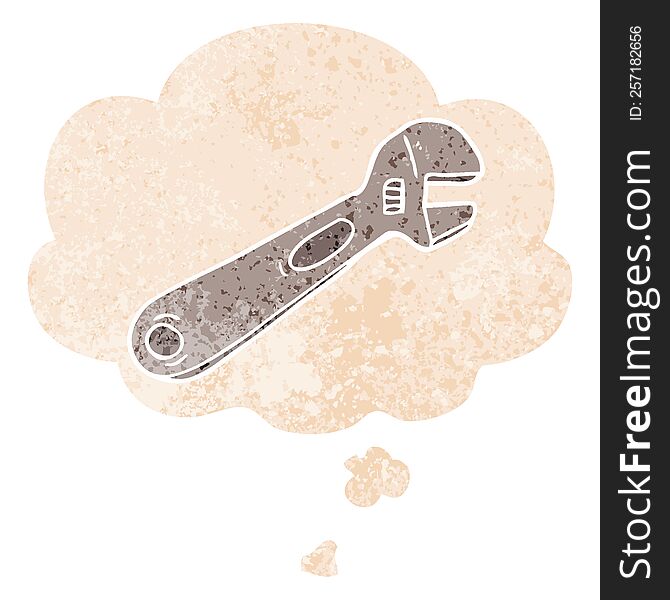 cartoon spanner with thought bubble in grunge distressed retro textured style. cartoon spanner with thought bubble in grunge distressed retro textured style