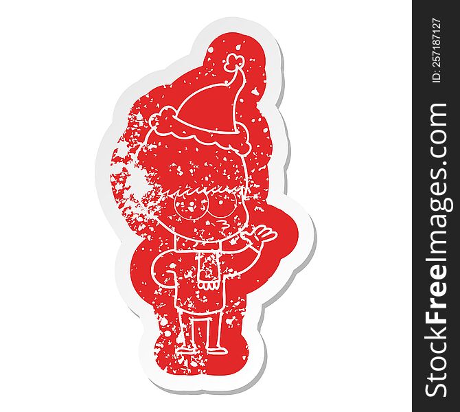 Nervous Cartoon Distressed Sticker Of A Boy Wearing Santa Hat