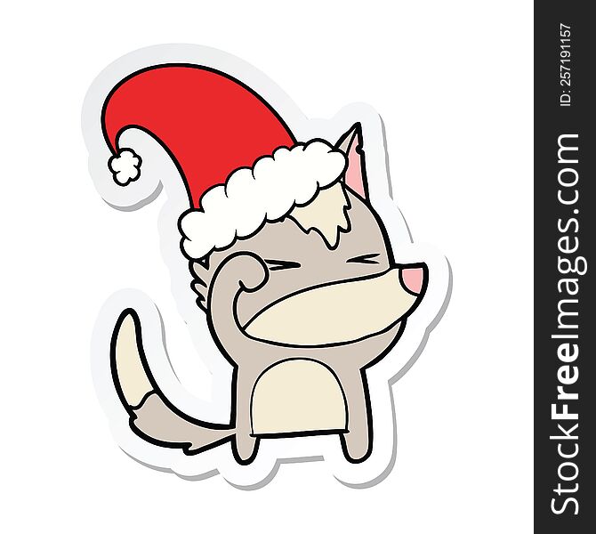 sticker of a tired wolf cartoon wearing xmas hat