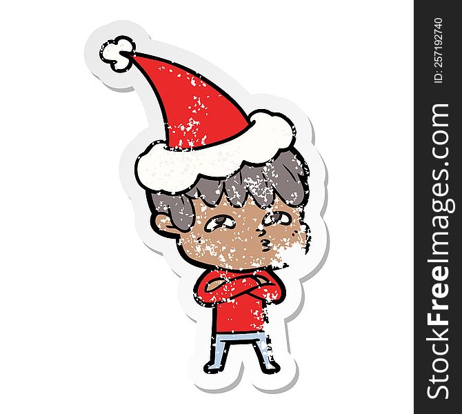 Distressed Sticker Cartoon Of A Curious Man Wearing Santa Hat