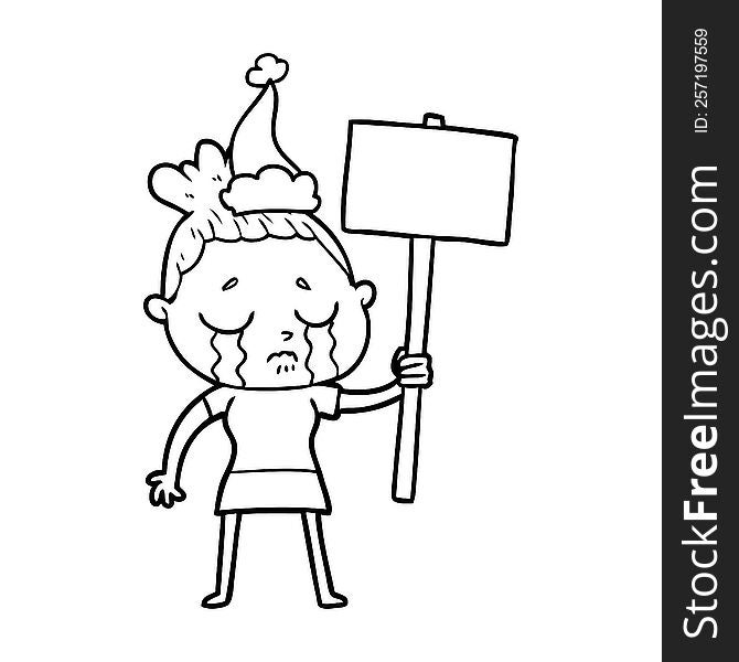 Line Drawing Of A Crying Woman With Protest Sign Wearing Santa Hat