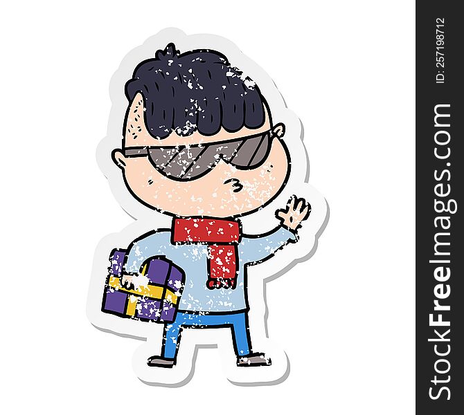 distressed sticker of a cartoon boy wearing sunglasses carrying xmas gift