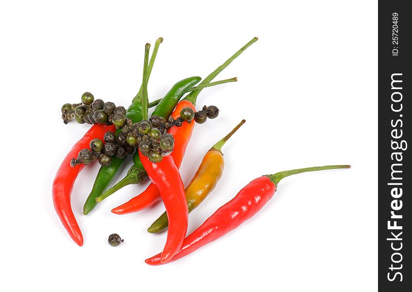 Mini Chili Peppers with pepper peas  on white background