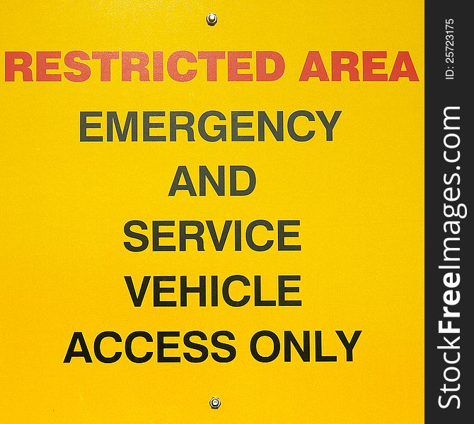 Warning sign for restricted vehicle access only. Warning sign for restricted vehicle access only.