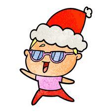 Textured Cartoon Of A Happy Woman Wearing Spectacles Wearing Santa Hat Stock Photo