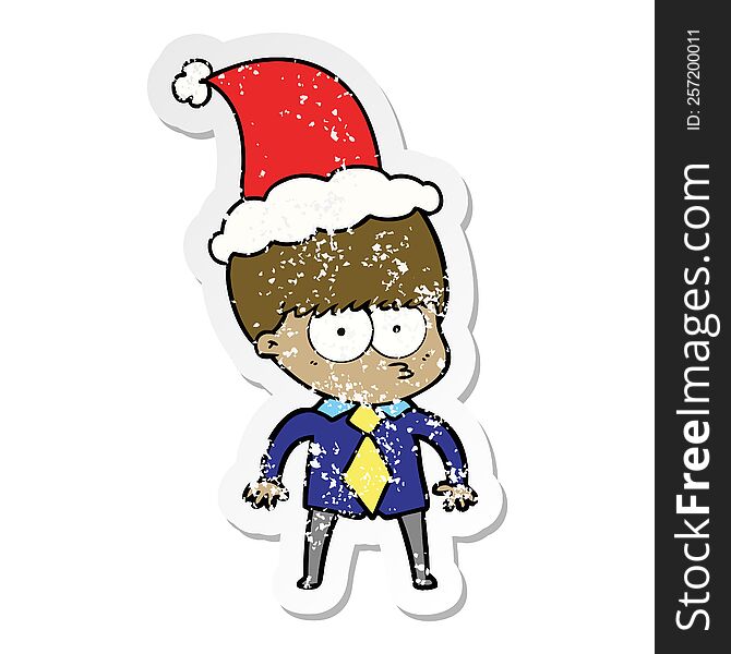 nervous hand drawn distressed sticker cartoon of a boy wearing shirt and tie wearing santa hat