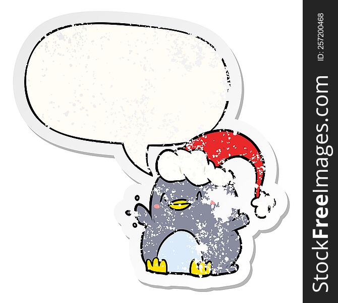 Cartoon Penguin Wearing Christmas Hat And Speech Bubble Distressed Sticker