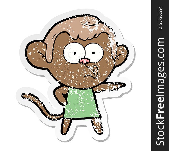 Distressed Sticker Of A Cartoon Pointing Monkey