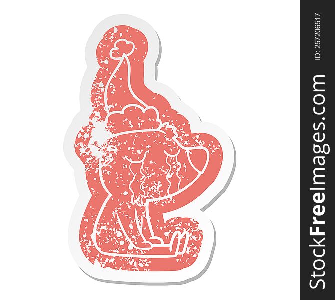 quirky cartoon distressed sticker of a crying sitting polar bear wearing santa hat