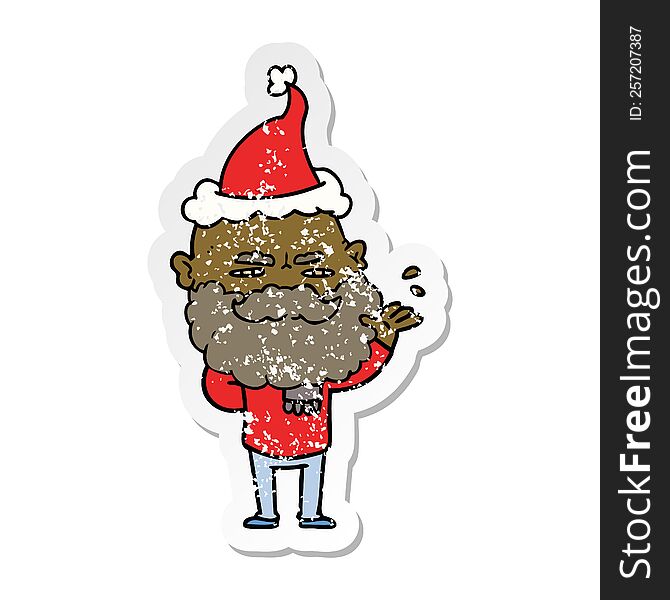 Distressed Sticker Cartoon Of A Dismissive Man With Beard Frowning Wearing Santa Hat