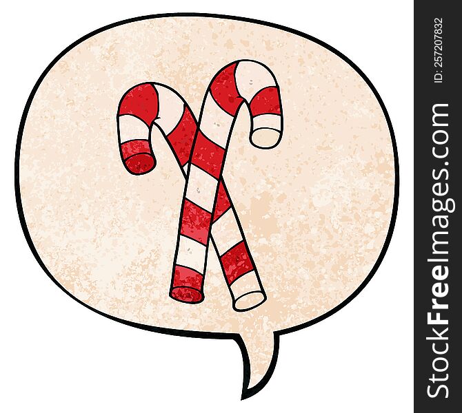 cartoon candy canes and speech bubble in retro texture style