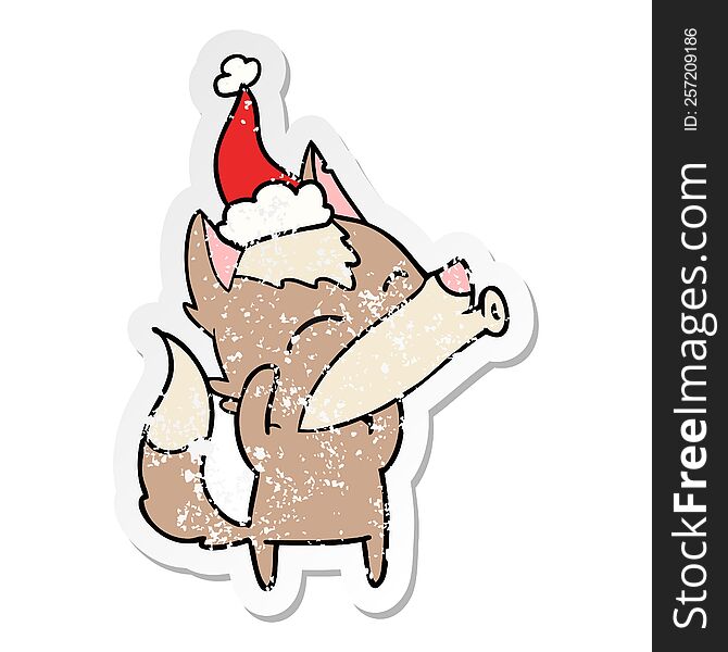 Howling Wolf Distressed Sticker Cartoon Of A Wearing Santa Hat