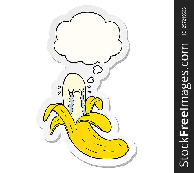 cartoon crying banana with thought bubble as a printed sticker
