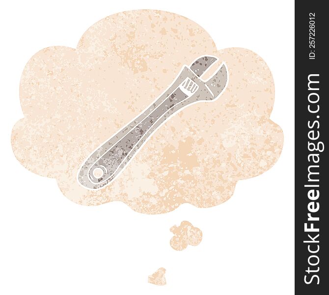 cartoon spanner with thought bubble in grunge distressed retro textured style. cartoon spanner with thought bubble in grunge distressed retro textured style