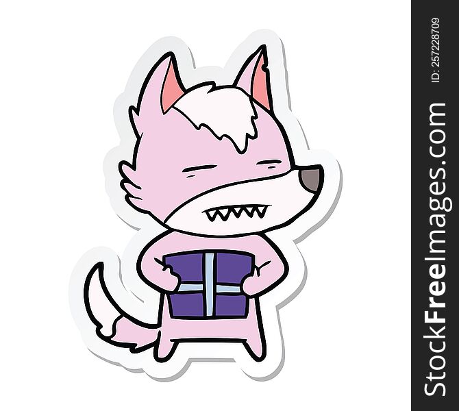 sticker of a cartoon wolf with a gift