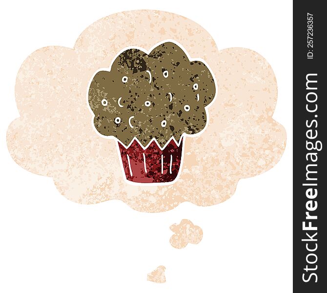 cartoon muffin with thought bubble in grunge distressed retro textured style. cartoon muffin with thought bubble in grunge distressed retro textured style