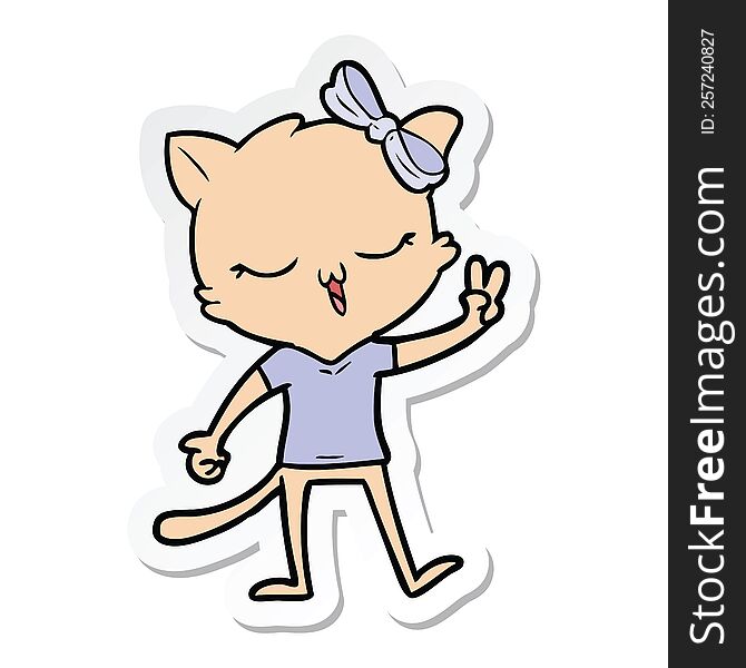 sticker of a cartoon cat with bow on head giving peace sign