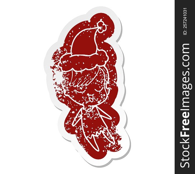 happy quirky cartoon distressed sticker of a girl wearing santa hat