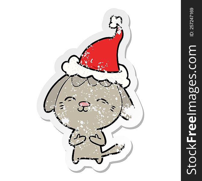 Happy Distressed Sticker Cartoon Of A Dog Wearing Santa Hat