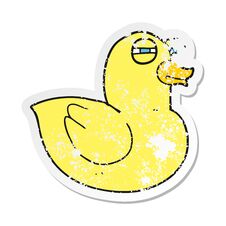 Retro Distressed Sticker Of A Cartoon Funny Rubber Duck Stock Image