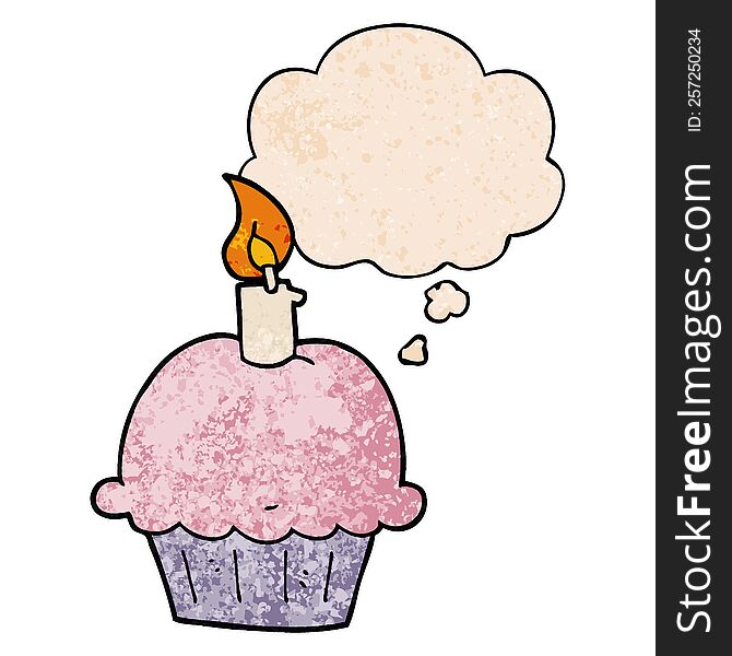 cartoon birthday cupcake with thought bubble in grunge texture style. cartoon birthday cupcake with thought bubble in grunge texture style