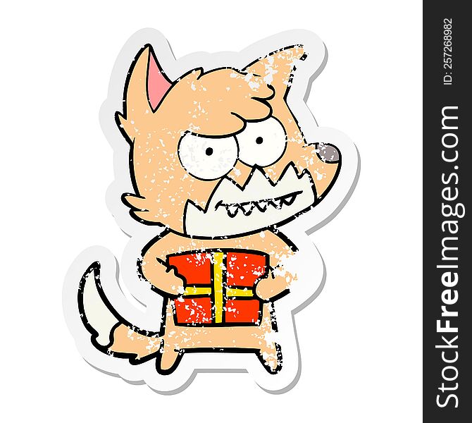 Distressed Sticker Of A Cartoon Grinning Fox With Present