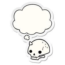 Cartoon Spooky Skull And Thought Bubble As A Printed Sticker Stock Photography