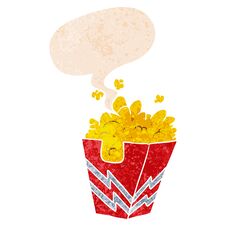 Cartoon Box Of Popcorn And Speech Bubble In Retro Textured Style Royalty Free Stock Photo