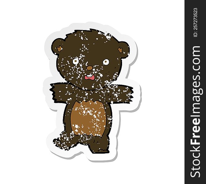 Retro Distressed Sticker Of A Cartoon Shocked Black Bear Cub