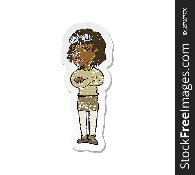 retro distressed sticker of a cartoon woman with crossed arms and safety goggles