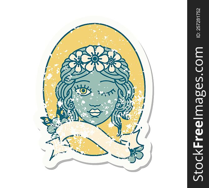 worn old sticker with banner of a maiden with crown of flowers winking