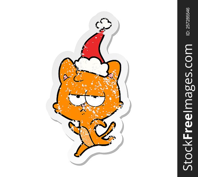 Bored Distressed Sticker Cartoon Of A Cat Wearing Santa Hat