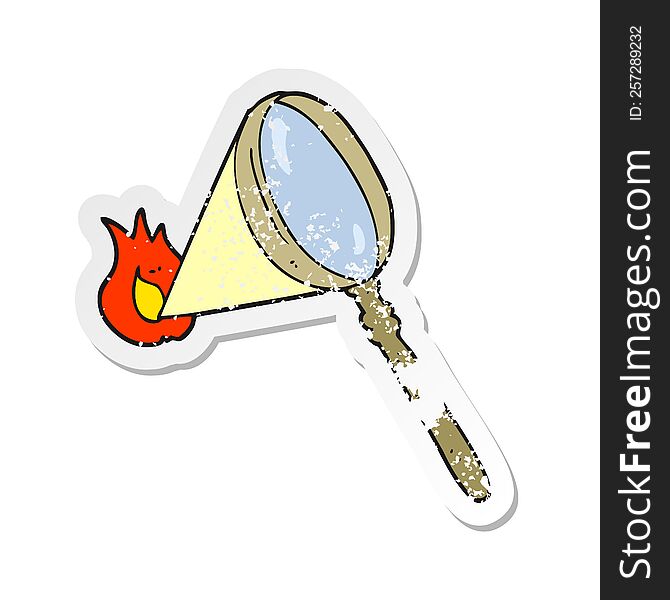 Retro Distressed Sticker Of A Cartoon Magnifying Glass Burning