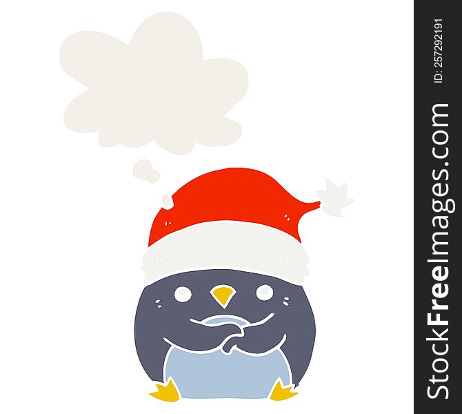 cute cartoon penguin wearing christmas hat with thought bubble in retro style