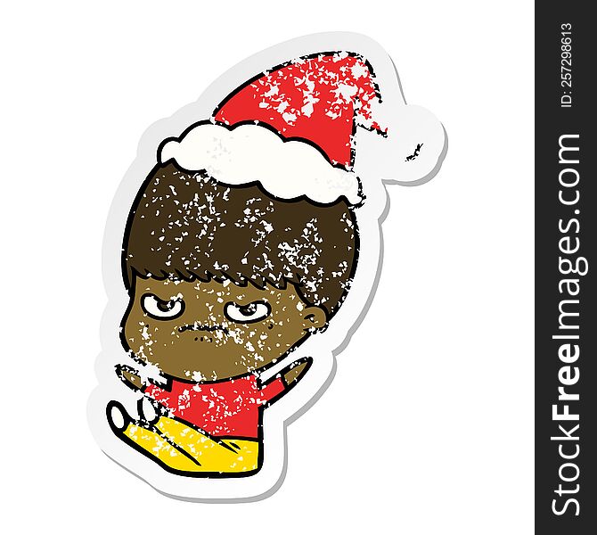 Distressed Sticker Cartoon Of A Boy Wearing Santa Hat