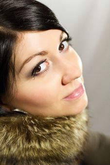 Beautiful Woman In A Fur Collar Stock Photo