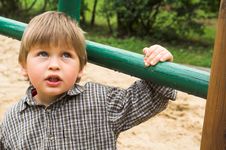 Boy On The Playground Royalty Free Stock Image