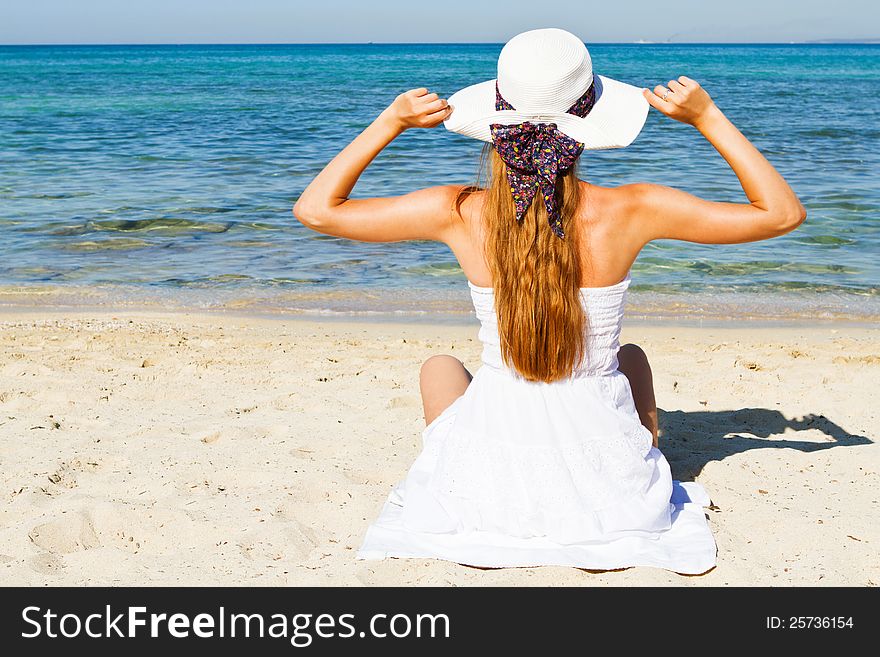 Young Woman On The Beach