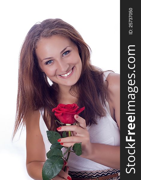 Portrait of attractive caucasian smiling woman isolated on white studio shot with red rose looking at camera. Portrait of attractive caucasian smiling woman isolated on white studio shot with red rose looking at camera