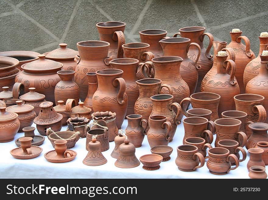 Tableware of handwork is made from red clay. Tableware of handwork is made from red clay