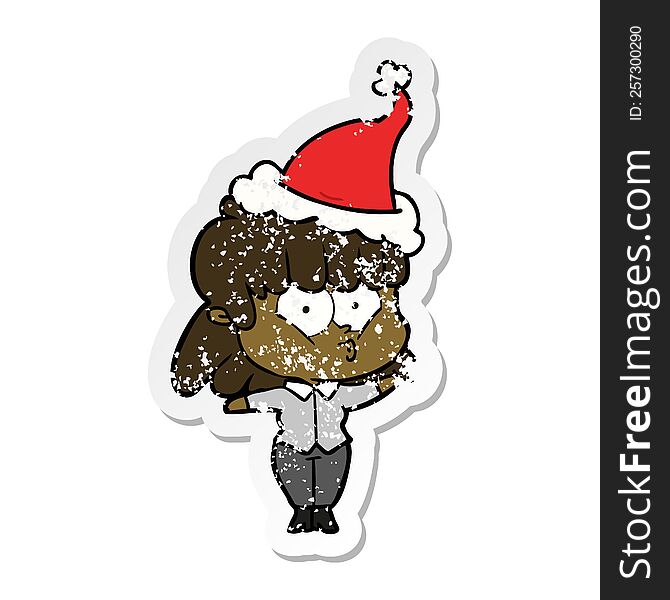 hand drawn distressed sticker cartoon of a whistling girl wearing santa hat