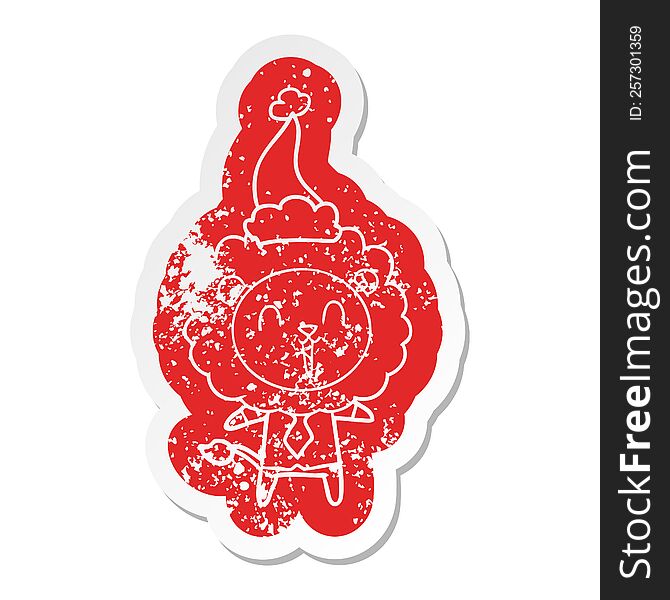 Laughing Lion Cartoon Distressed Sticker Of A Wearing Santa Hat