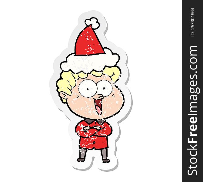 Distressed Sticker Cartoon Of A Happy Man Wearing Santa Hat